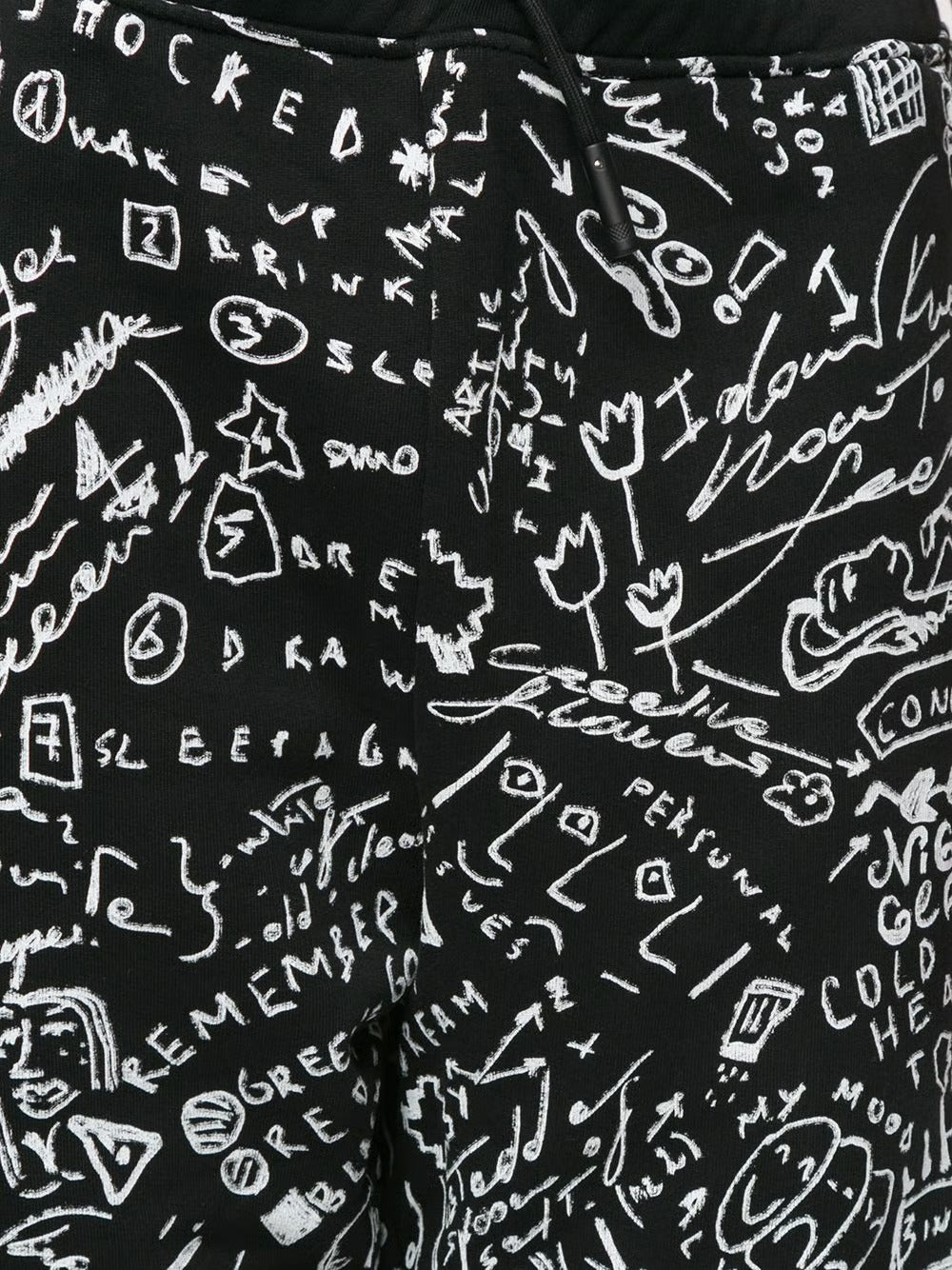 MARCELO BURLON C OF MILAN HOME scribble print track pants